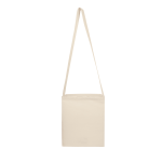A beige Sling Bag with a long shoulder strap, featuring a simple design and a branding logo.