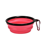 A pink silicone collapsible pet bowl with a black rim and a carabiner for easy attachment.