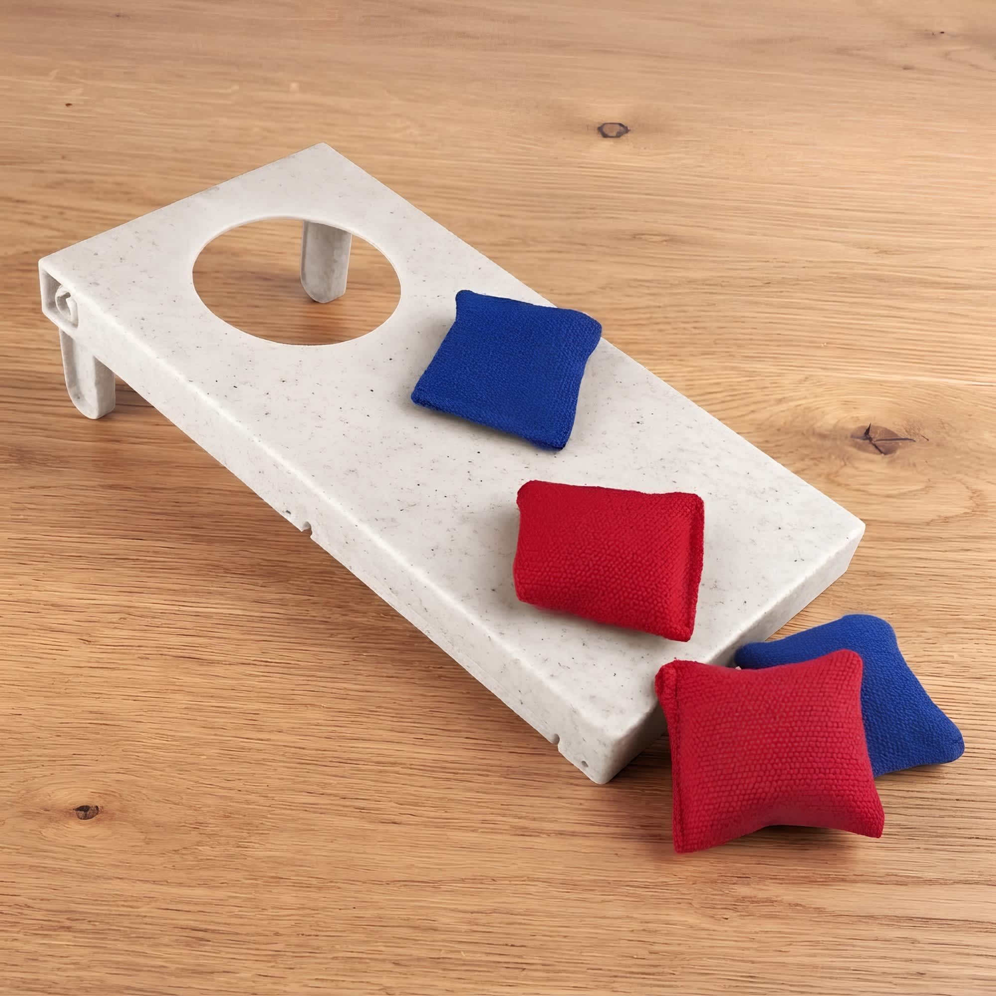 A cornhole board made of wheat straw in a light colour, accompanied by four small, red and blue bean bags. Wheat Straw Cornhole - Image 1