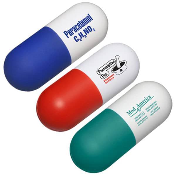 A capsule-shaped stress reliever in blue, red, and green, with a logo on one side. Capsule Shape Stress Reliever - Image 1