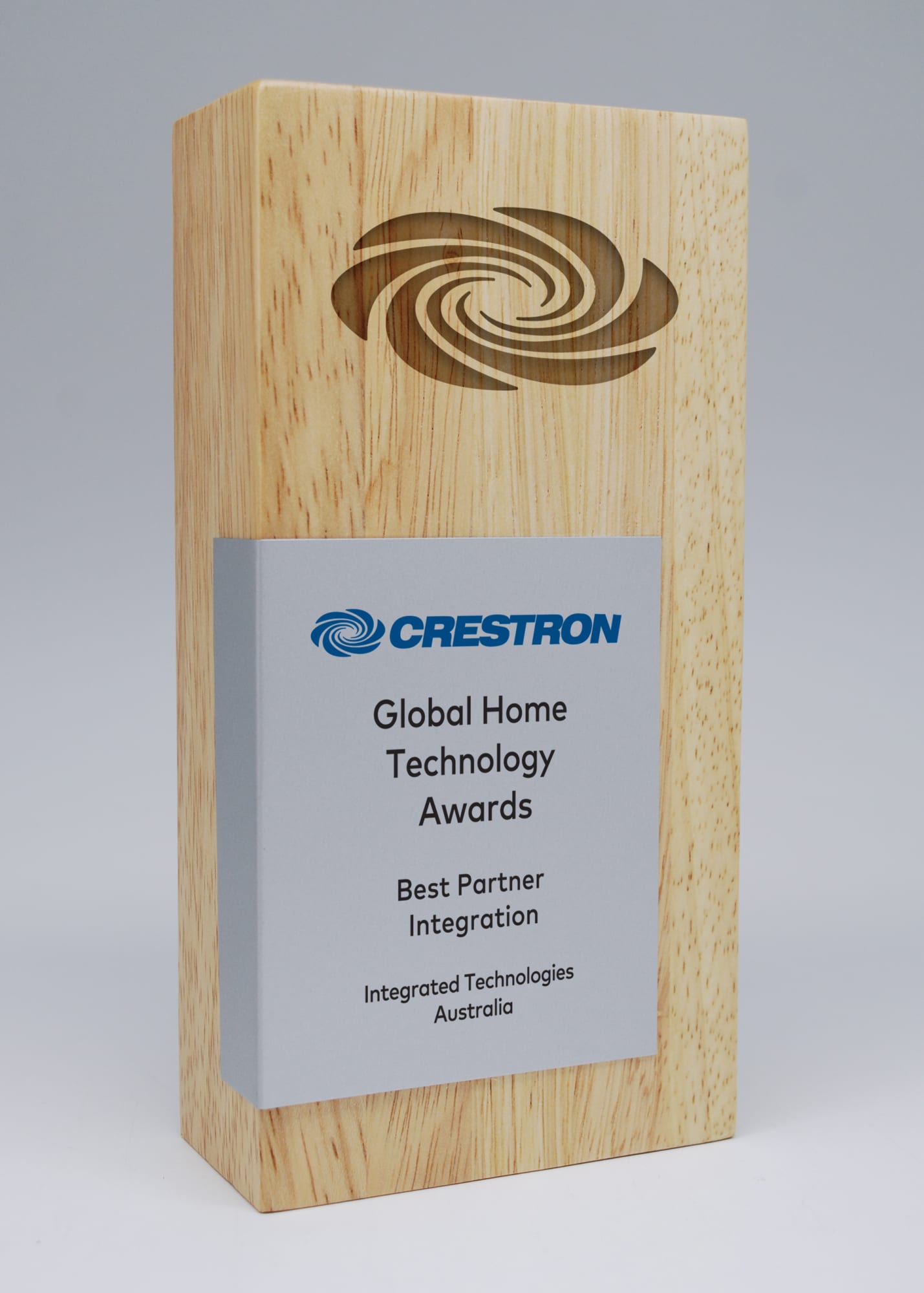 A wooden award with a printed metal plate and a spiral design, featuring light wood tones and a silver plate. Column Wood Award with Printed Metal Plate - Image 1