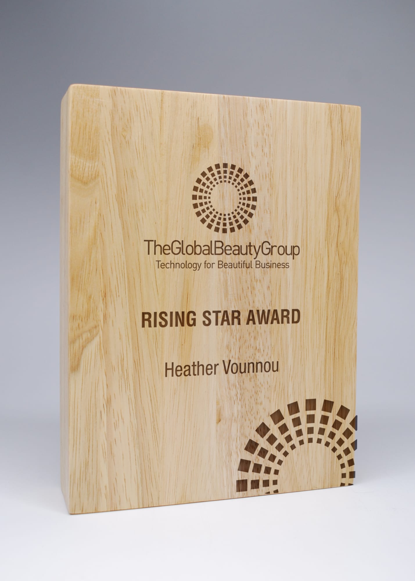 A wooden block award with engraved text and a logo, showcasing a light timber finish. Wood Block Award - Add Engraving Costs - Image 1