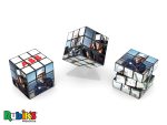 A Rubik's Cube 3x3 (57mm) features mixed images and a logo, with a classic multicolour design displayed on a stand.