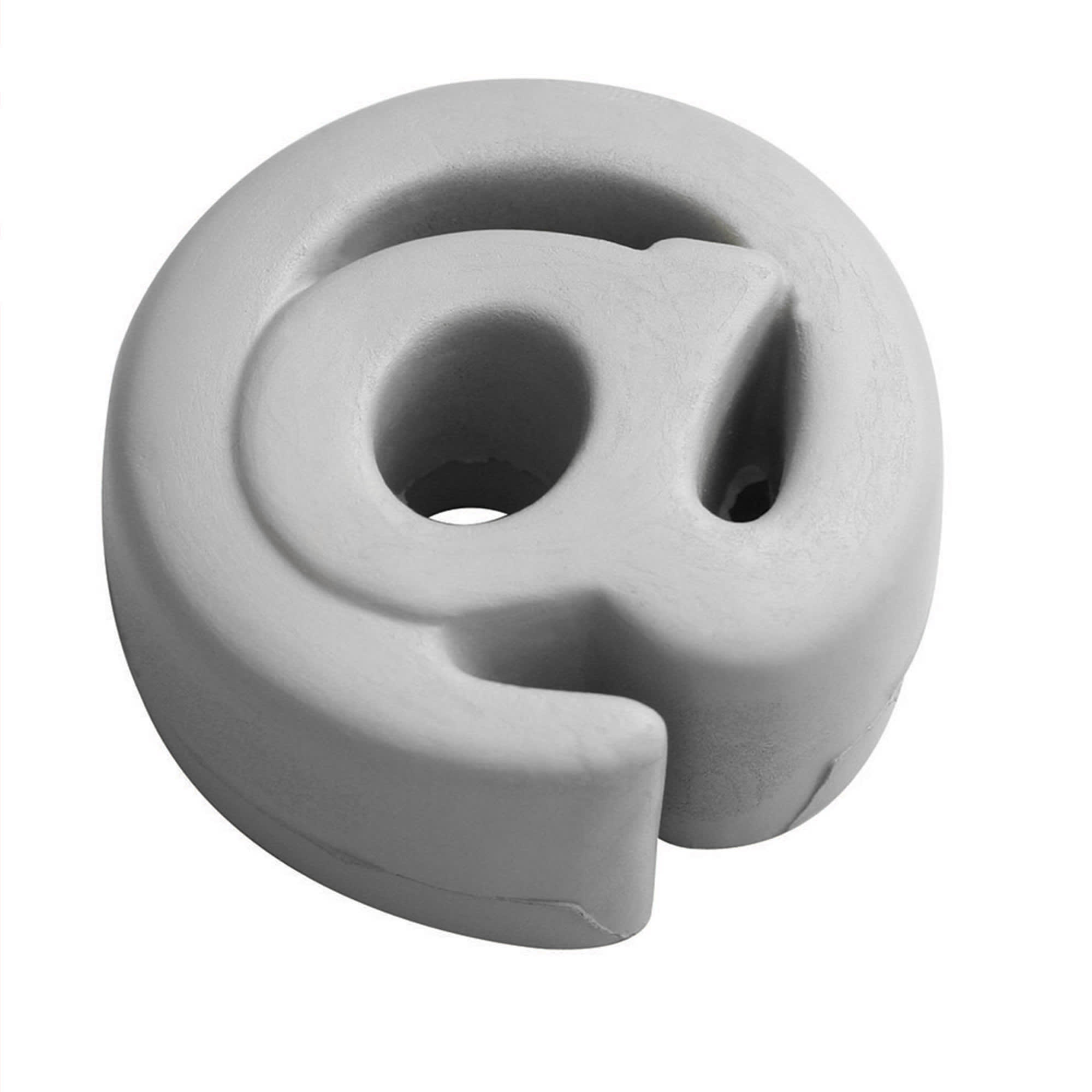 A grey stress relief shape featuring an '@' symbol design. The item has a smooth, rounded texture. Stress @ Shape - Image 1