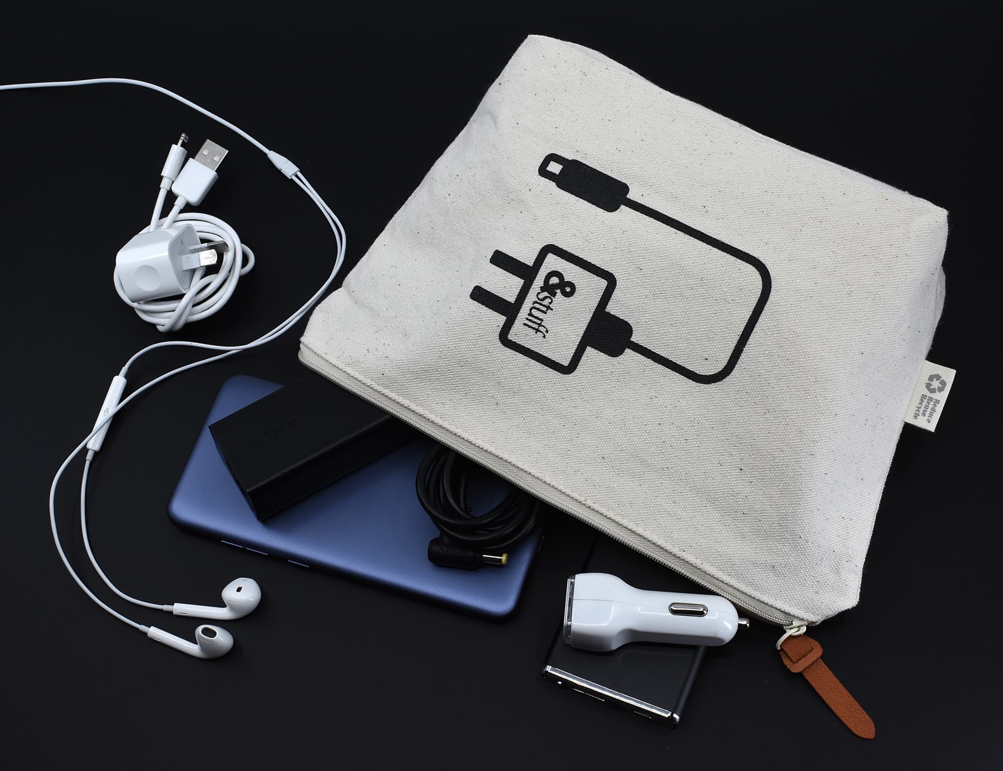 A cream-coloured tech pouch with various gadgets inside, including earphones, chargers, and a smartphone. Calico Tech Pouch 17cm x 27cm x 8.5cm - Image 1