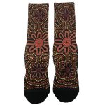 Full sublimation socks featuring a black background adorned with intricate floral patterns in red, yellow, and orange.