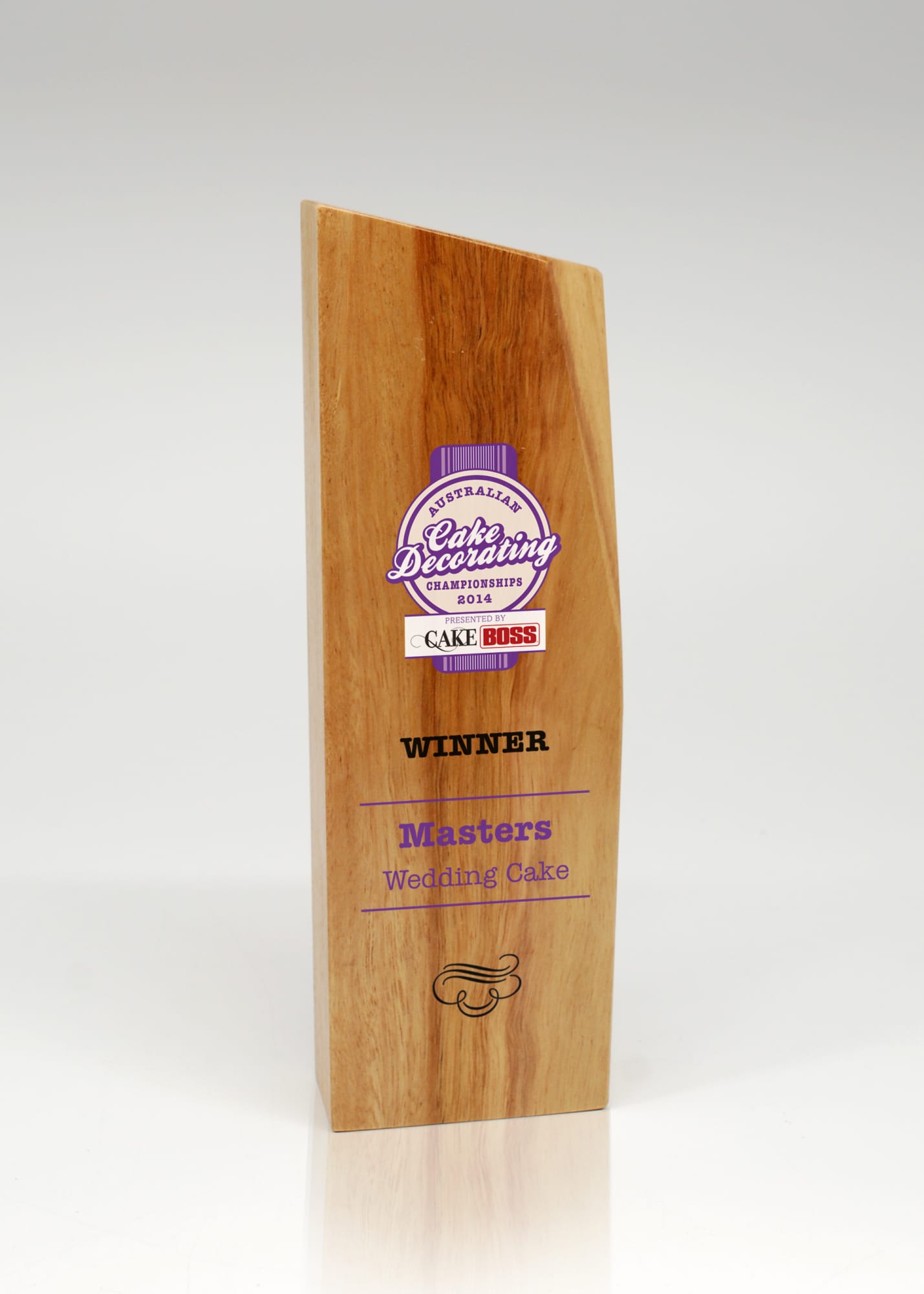 A trophy made of light brown Australian hardwood with a modern design and a logo. Australian Select Grade Blackbutt Geomet Trophy - Image 1