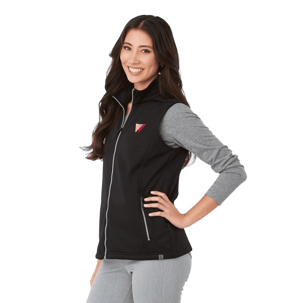 A black eco waterproof softshell vest with a grey sleeve, featuring a logo on the chest. Women's Joris Eco Waterproof Softshell Vest - Image 1