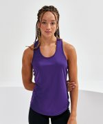 A purple performance strap back vest on a model with braided hair, posing against a neutral background.