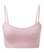 A light pink sport bra with thin straps and a seamless design. It has a branding logo on the side.