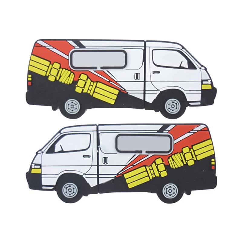Custom moulded flash drives in the shape of a white van with red and yellow designs, featuring a logo. Custom Moulded Flash Drives - Image 1