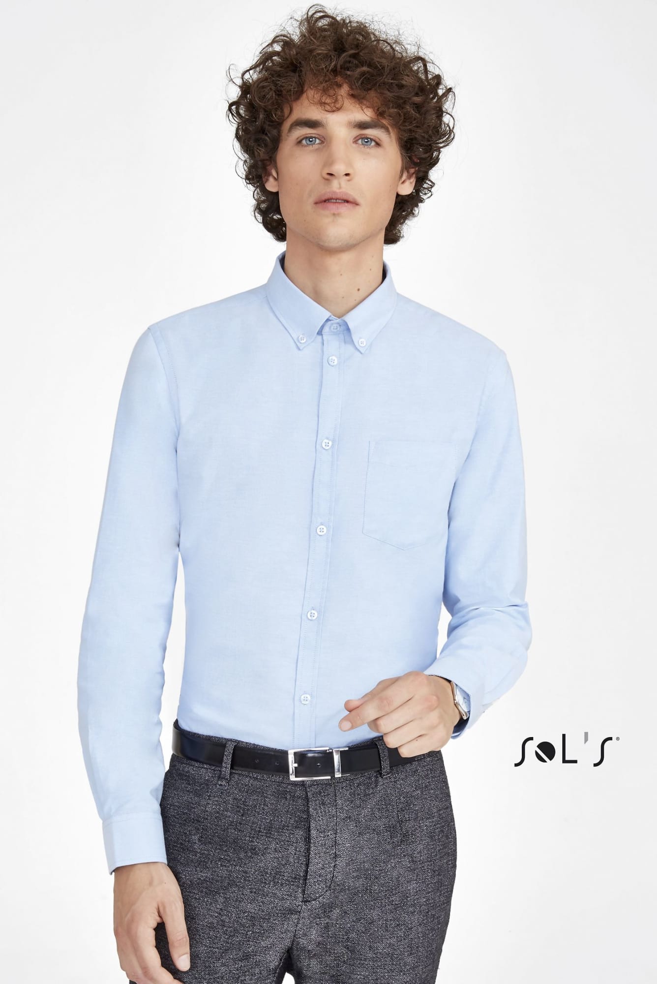 A light blue long sleeve Oxford shirt for men, featuring a button-down front and a chest pocket. It has a logo. Business shirt BOSTON FIT LONG SLEEVE OXFORD MEN’S SHIRT - Image 1