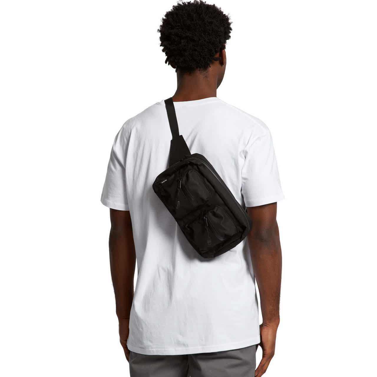 A black recycled double waist bag worn across the back of a person in a white T-shirt. The bag features a logo. Recycled Double Waist Bag - Image 1
