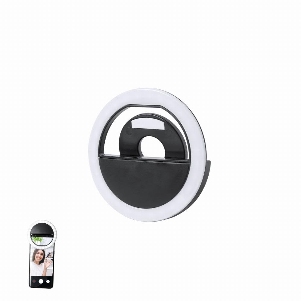 A ring light with a black and white design, featuring a circular shape and a small camera attachment for selfies. Picmont - Image 1