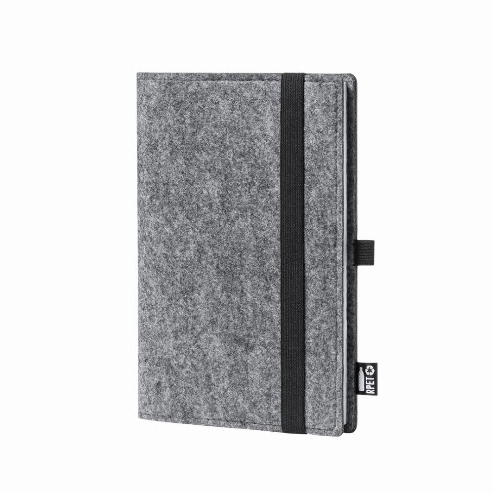 A grey felt notebook with a black elastic band and a logo on the side. It has a simple, minimalist design. Nibir - Image 1