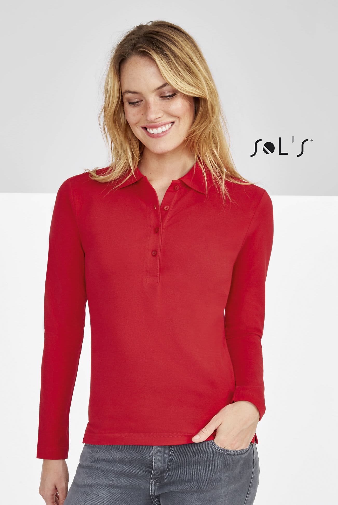 A red women's long sleeve polo shirt made of 100% combed ring spun cotton, featuring a logo. Polo shirt women's long sleeve 100% combed ring spun cotton PODIUM - Image 1