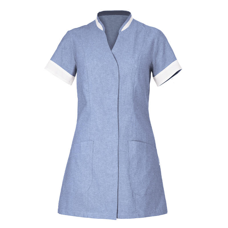 Aurelia Tunic in blue with white accents, featuring a short sleeve design and two front pockets. Aurelia Tunic - Image 1