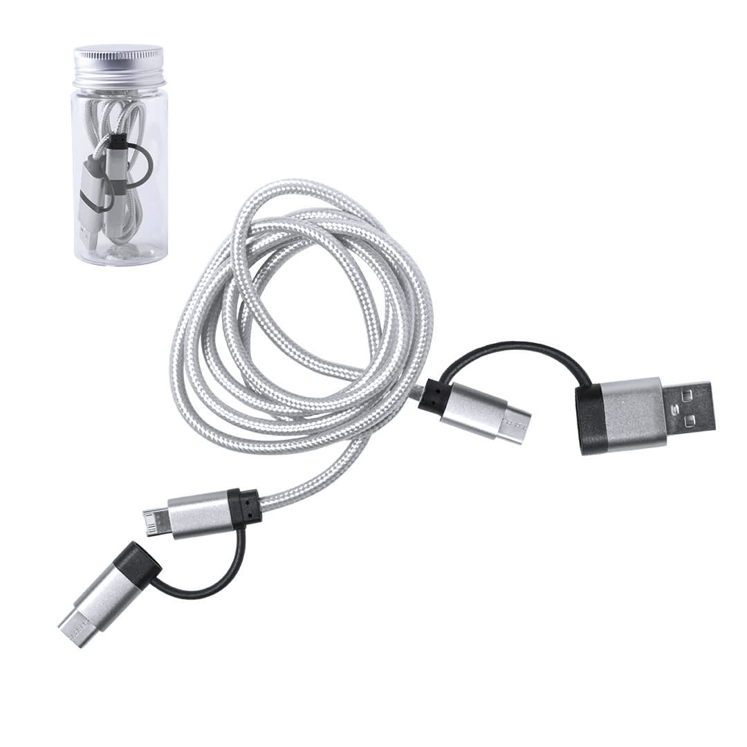 A silver charging cable with multiple ends contained in a circular clear case. The cable has a braided design. Trentex Charging Cable - Image 1