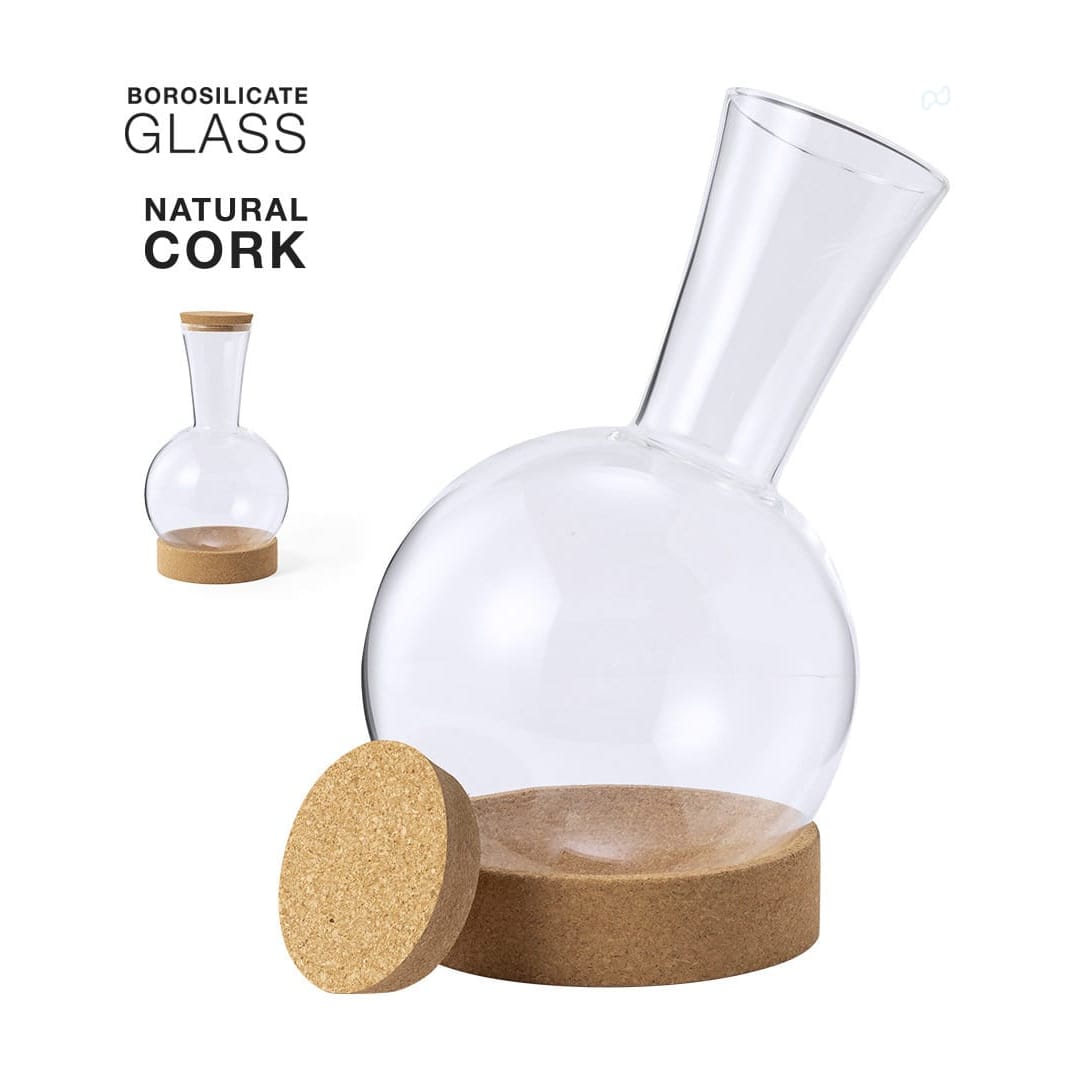 A wine decanter made of clear borosilicate glass with a natural cork base. Features a distinctive curved shape. Seirten Wine Decanter - Image 1