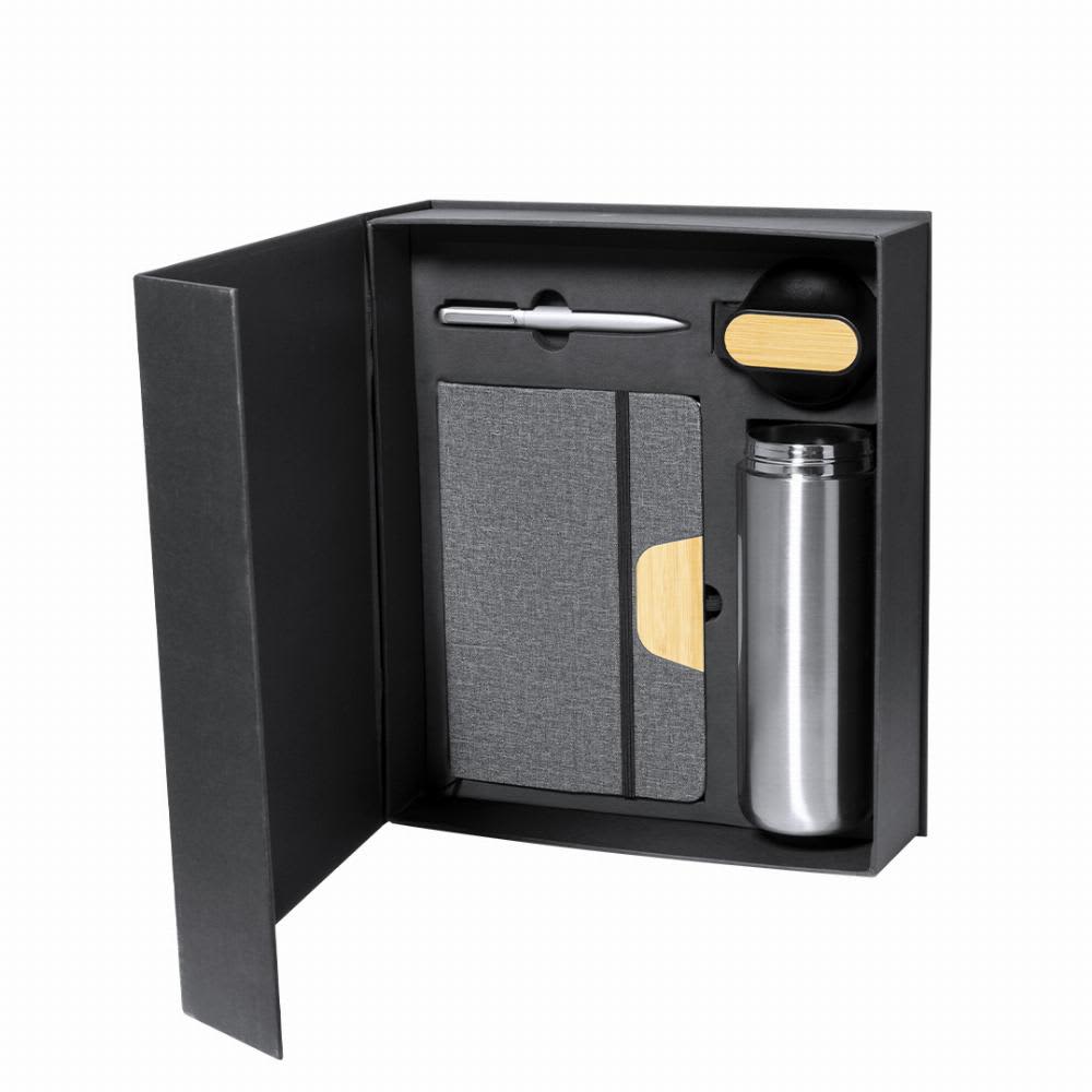A gift set featuring a silver drink bottle, grey notebook, pen, and a black item, all in a black box. Halderan - Image 1