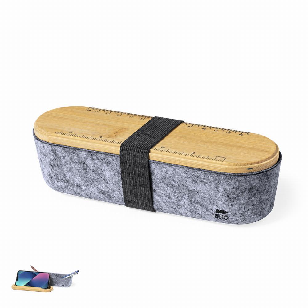 A pencil case made of grey felt with a wooden lid featuring a ruler, secured with a black elastic band. Glaston - Image 1