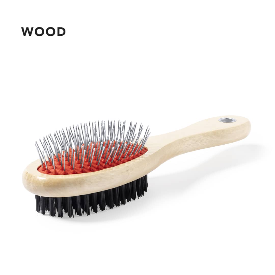 A pet brush featuring a wooden handle, metal bristles, and a red cushion base, suitable for grooming pets. Brolin Pet Brush - Image 1