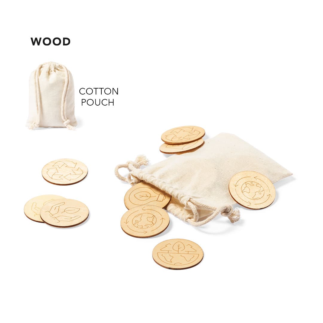 A cotton pouch containing wooden tokens with various designs, scattered around it. The pouch is light-coloured. Lauby Game - Image 1