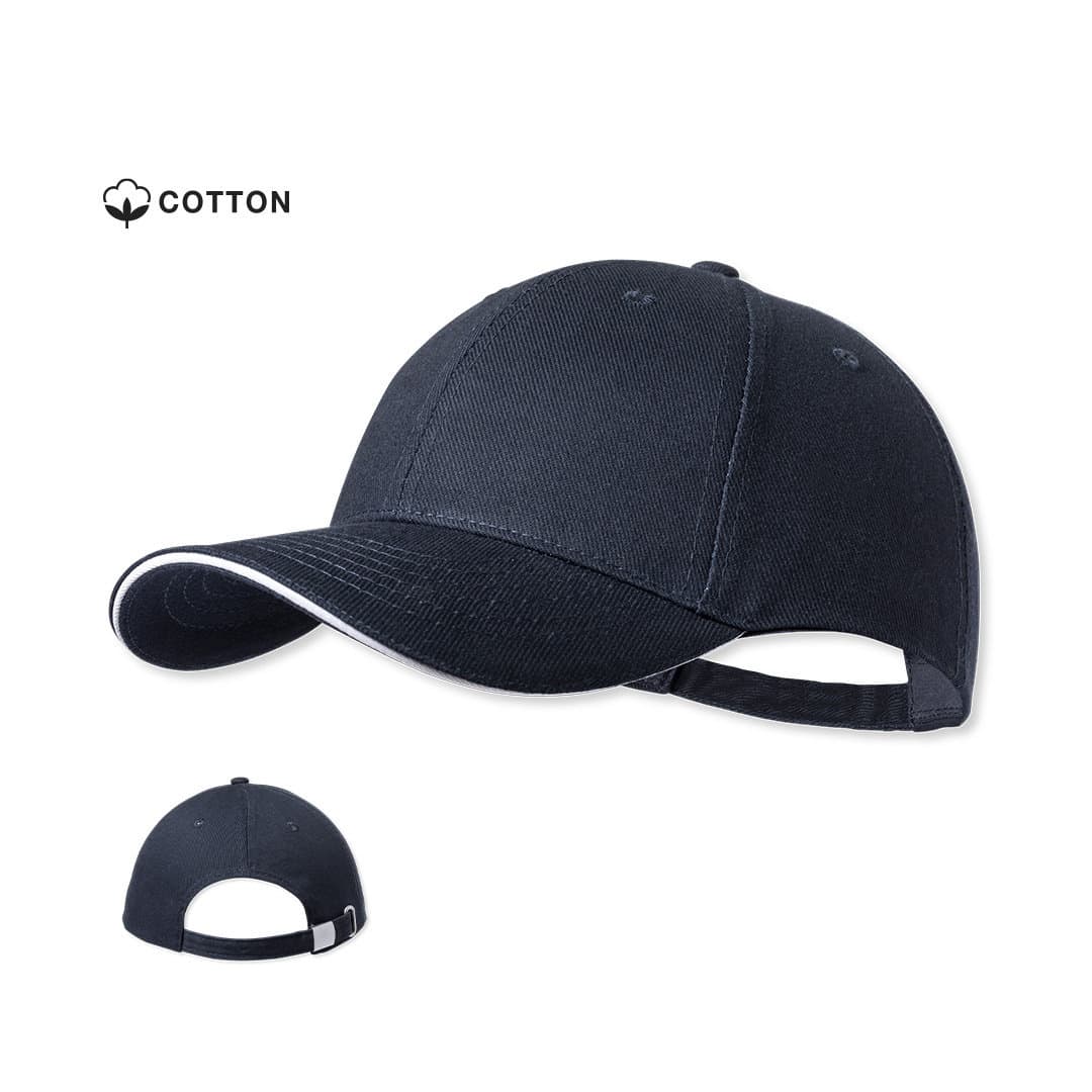 A cotton baseball cap in black with a white accent on the brim. Features an adjustable strap at the back. Linnea - Image 1