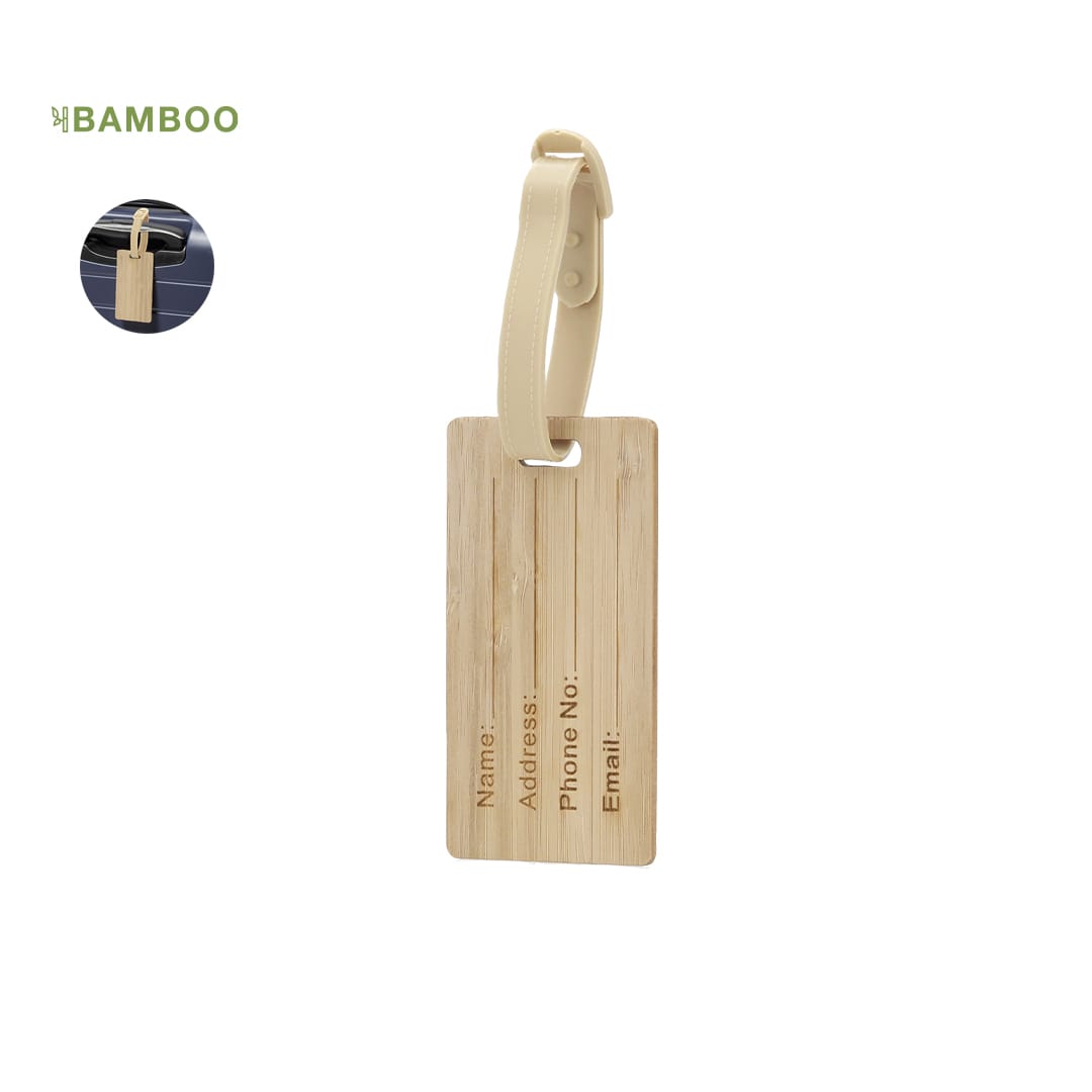 A bamboo luggage tag with a cream strap and spaces for personal information. It features a simple, natural design. Elwes Luggage Tag - Image 1