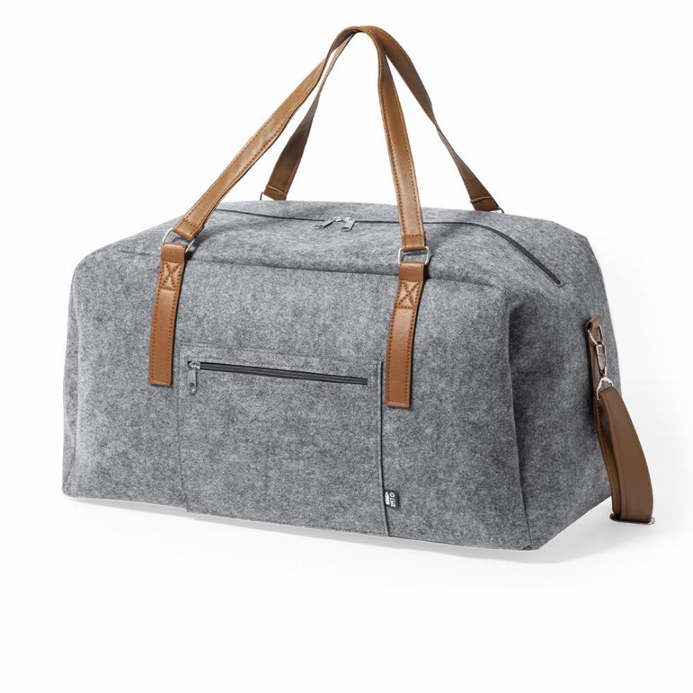 A grey duffel bag with brown leather straps, featuring a zippered compartment and a front pocket. Denver - Image 1