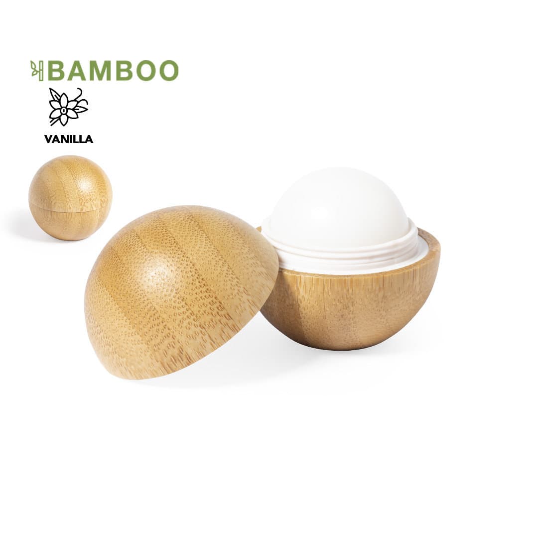 A bamboo lip balm container in a half-sphere design, featuring a white balm core and a natural wooden exterior. Bowok Lip Balm - Image 1