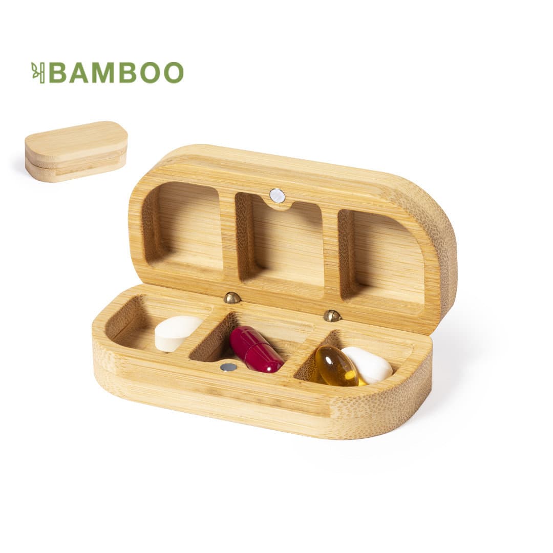 A bamboo pill organiser with three compartments, featuring white, red, and yellow capsules inside. It has a branded logo. Pensol - Image 1