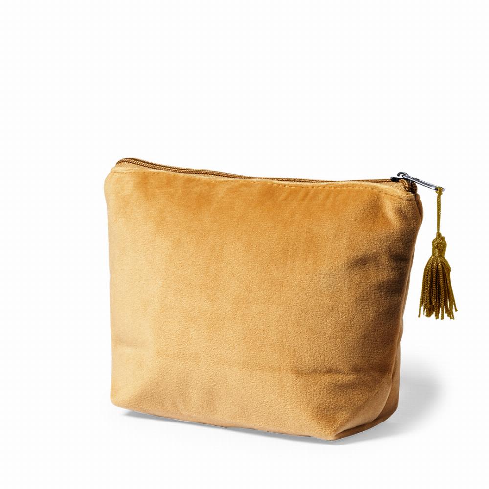 A cosmetic bag in a soft tan colour, featuring a zipper and a decorative tassel. The fabric has a plush texture. Roger - Image 1
