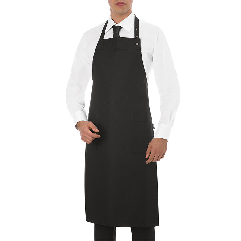 A black apron worn by a person in a white shirt and tie, featuring a pocket and a logo. Anversa Apron - Image 1