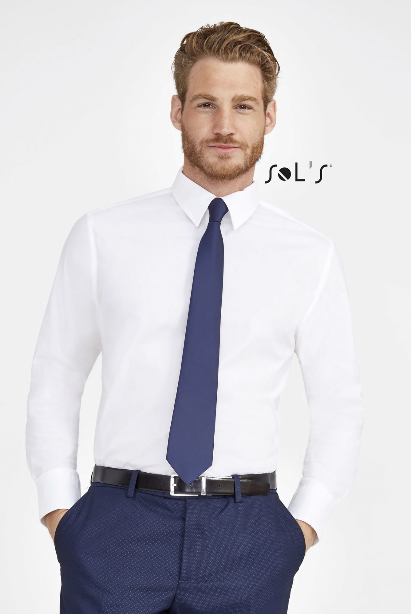 A men's long sleeve shirt in white, paired with a navy tie, showcasing a polished and professional look. Business shirt BRIGHTON LONG SLEEVE STRETCH MEN'S SHIRT - Image 1