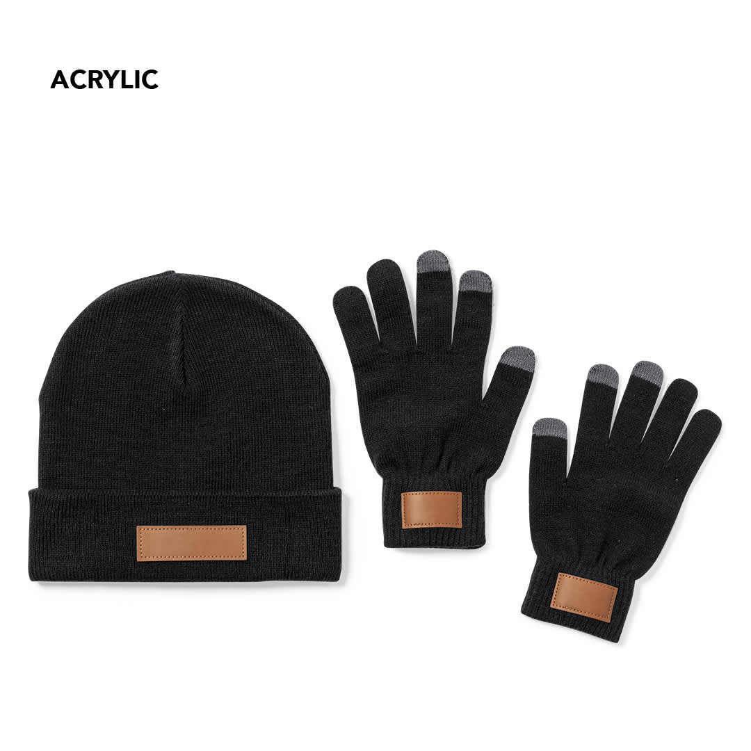 A black acrylic beanie and matching black gloves with leather accents, featuring a logo on both items. Prasan Set - Image 1