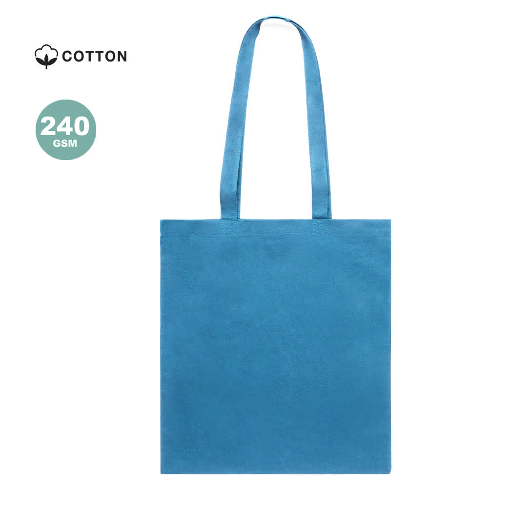A turquoise tote bag made of cotton, featuring two handles and a simple design. It has a branding logo. Xental Bag - Image 1