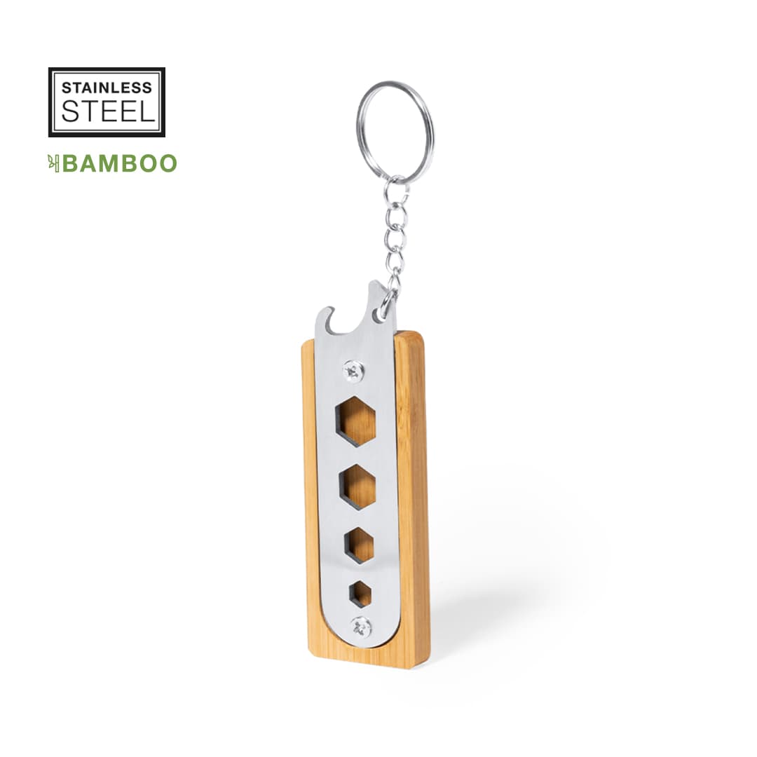 A bamboo and stainless steel multitool keyring featuring multiple hexagon openings and a keychain attachment. Balmy Multitool Keyring - Image 1