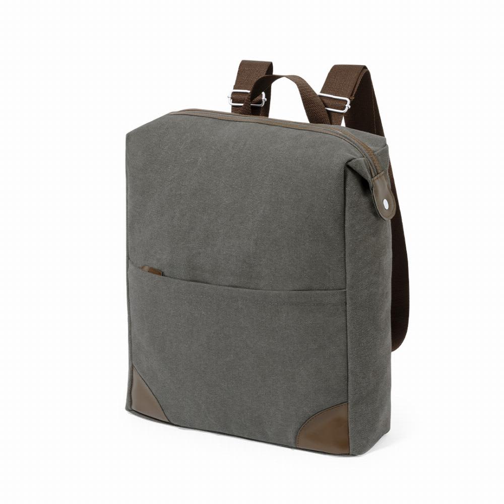A grey backpack with brown leather accents and a front pocket, featuring shoulder straps for carrying. Grant - Image 1