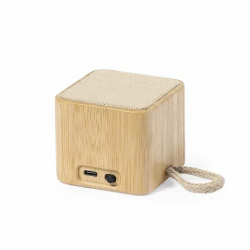 A wooden cube speaker with a beige fabric top and a braided handle, featuring a USB-C and audio input. Kiefer - Image 1