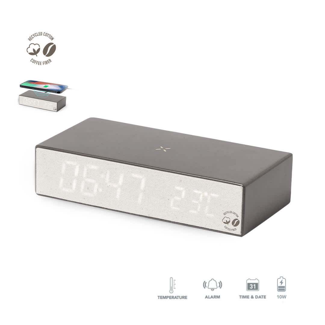 A grey multifunction alarm clock with a digital display for time and temperature, featuring a wireless charging pad. Barret Multifunction Alarm Clock - Image 1