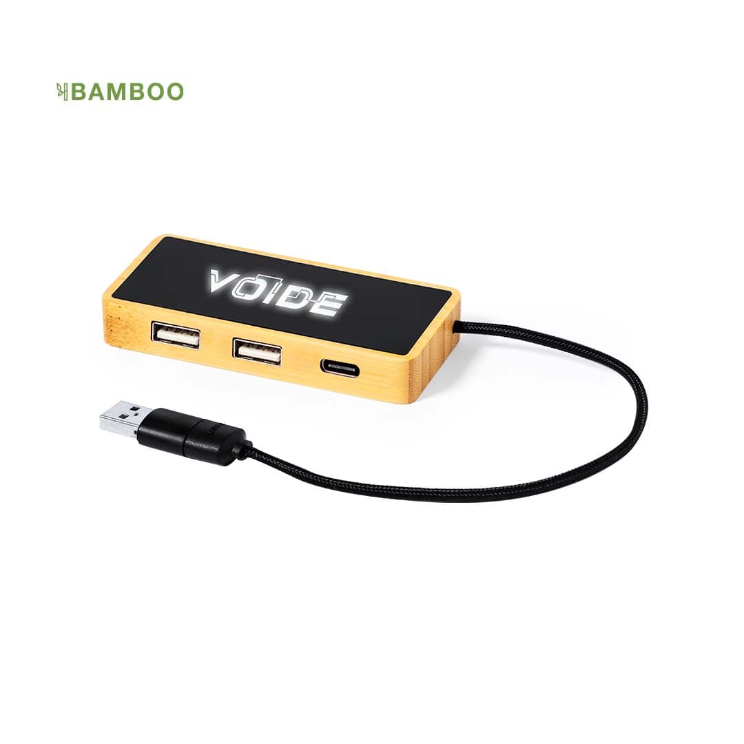 A USB hub with two standard ports and one USB-C port, featuring a bamboo casing and a logo on top. Ginger - Image 1