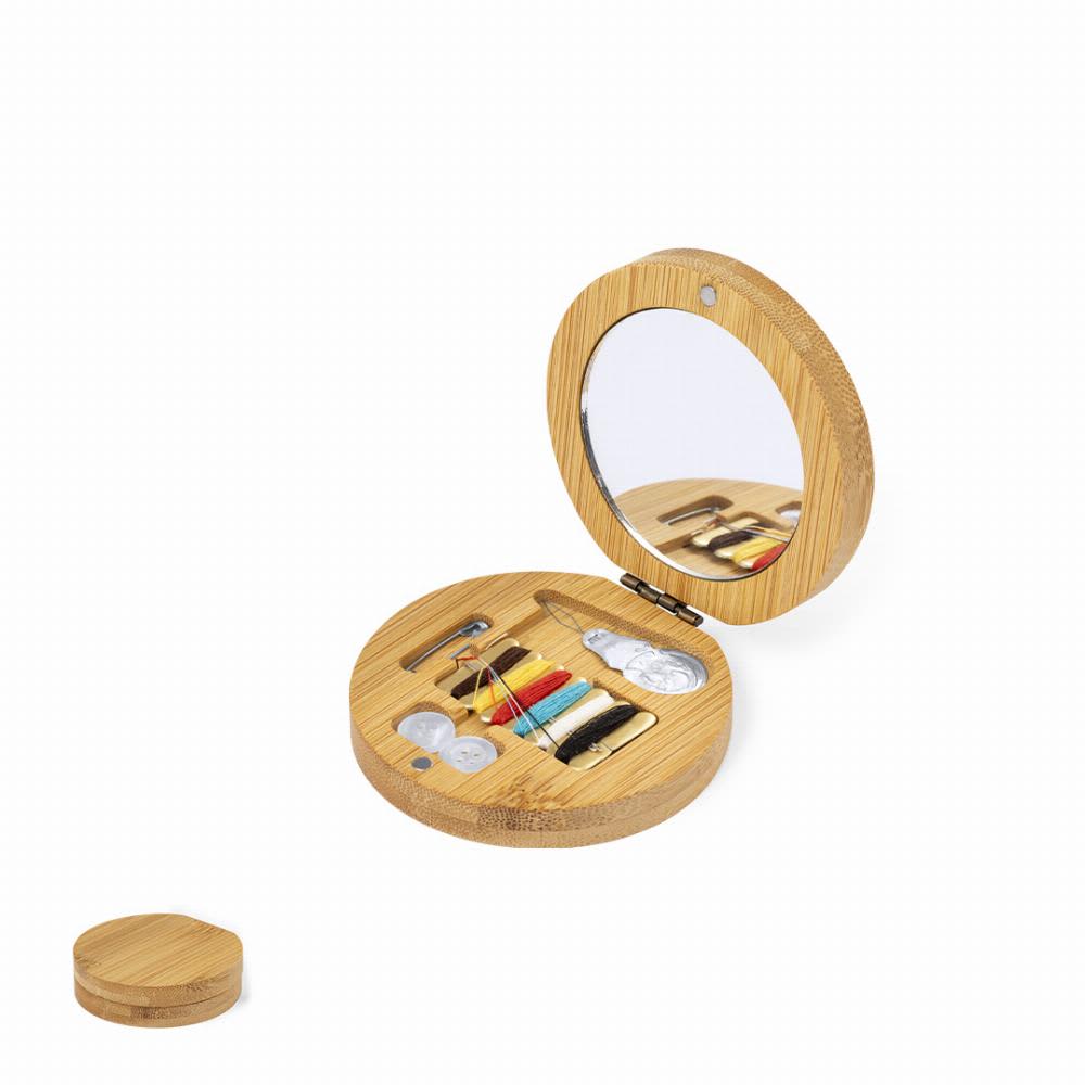 A sewing kit in a round bamboo case, featuring a mirror, threads, needles, buttons, and accessories. Atriax - Image 1