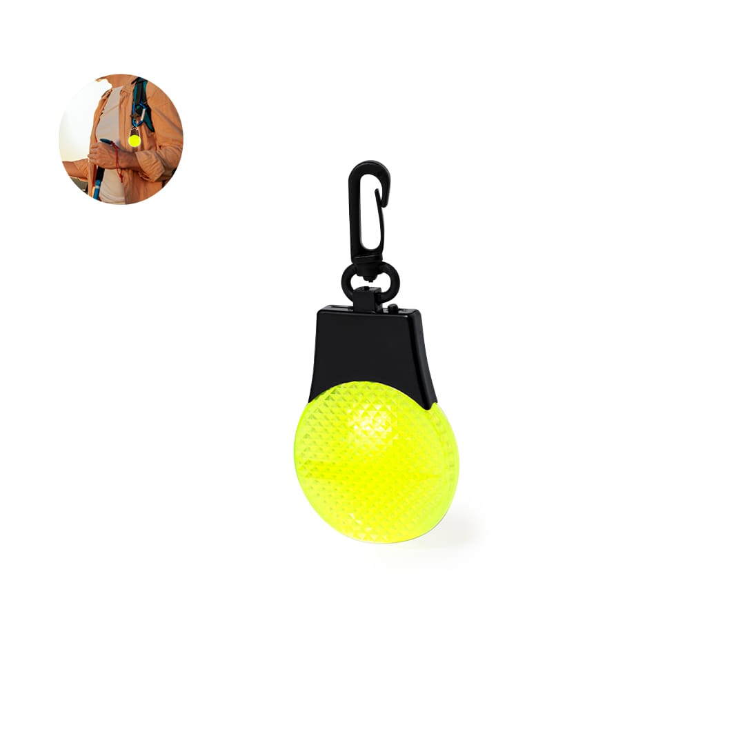A security light in bright yellow with a black clip for easy attachment, featuring a textured surface. Elektra Security Light - Image 1