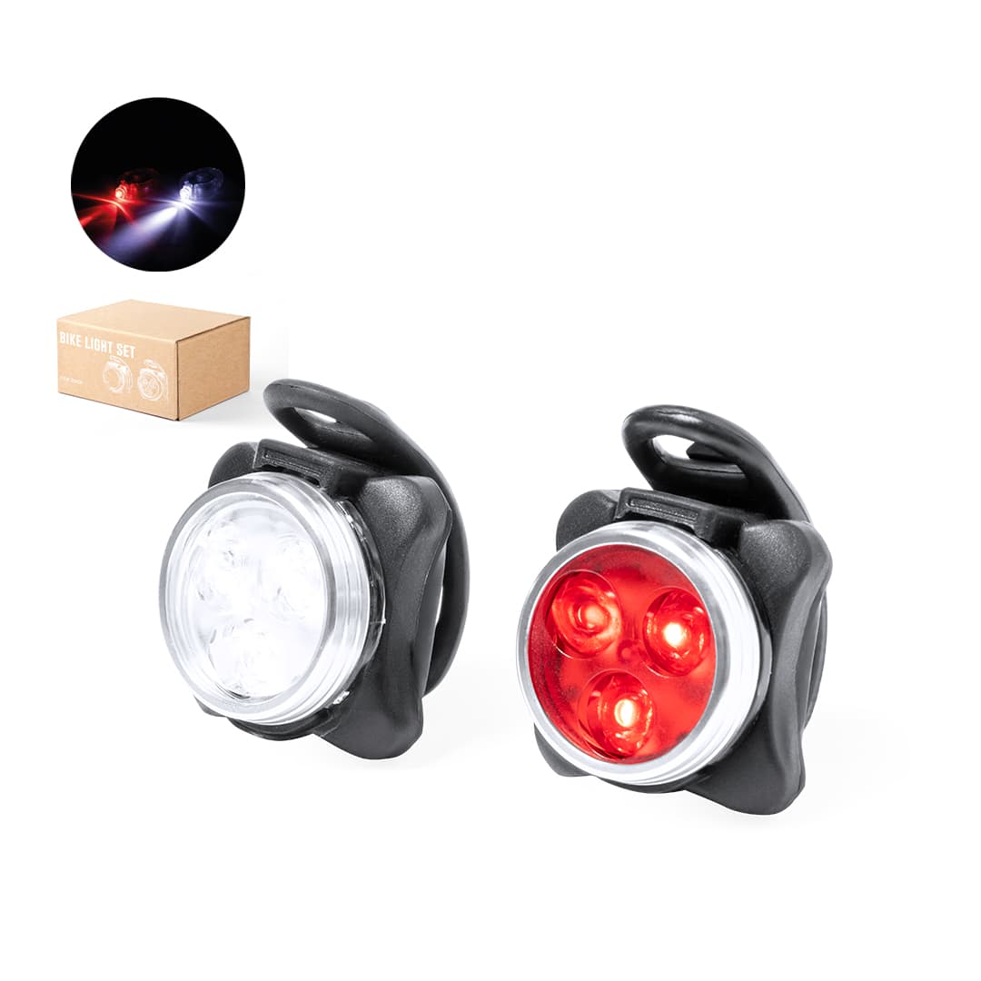 A bike safety light set featuring a red light and a white light, both in black casings, with a packaging box shown. Remko Bike Safety Light Set - Image 1