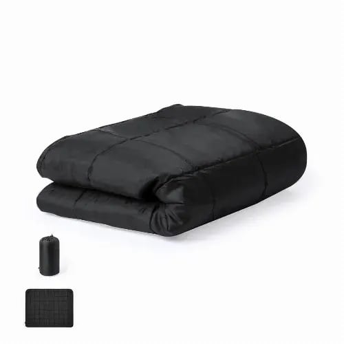 A black sleeping bag neatly folded, accompanied by a compact storage bag. The fabric has a quilted texture. Barea - Image 1