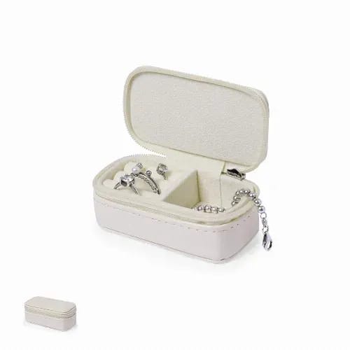 A jewellery box in white with a soft interior, containing various silver rings and a bracelet. Moly - Image 1