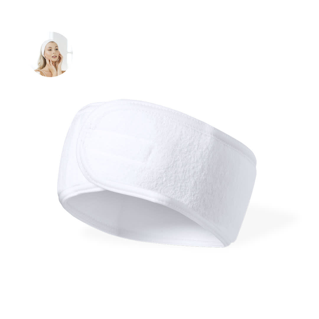 A white beauty headband with a textured surface and a logo, designed for headwear use. Madax Headband - Image 1