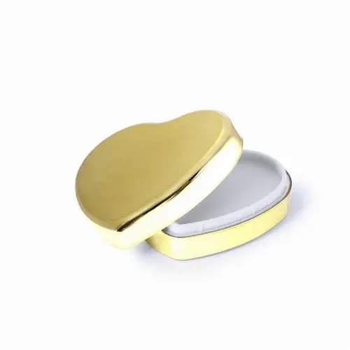 A heart-shaped gold box with a white interior, slightly open to reveal its contents. Mushu - Image 1