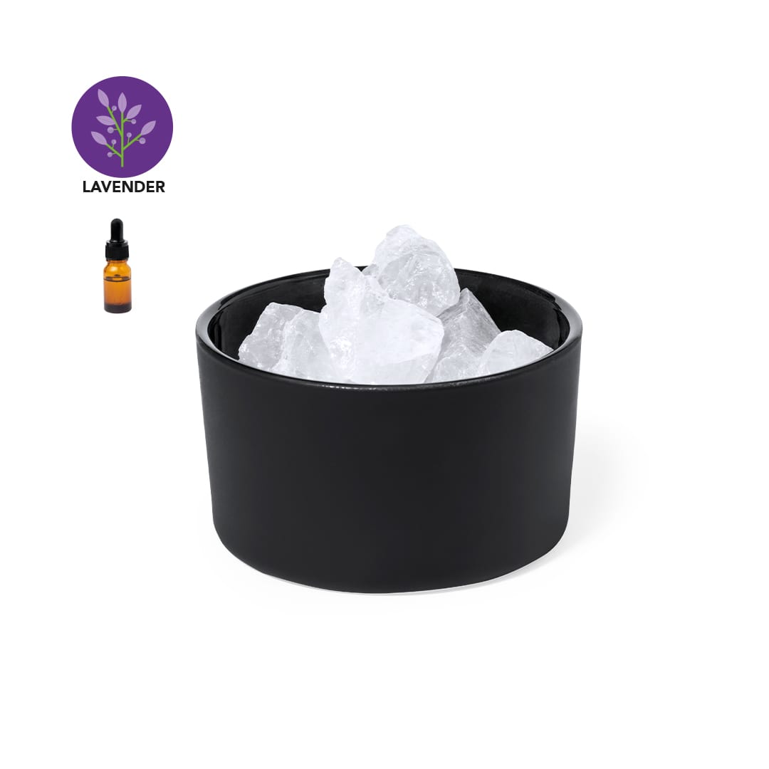 A black bowl filled with clear crystals, accompanied by a small amber bottle of lavender essential oil. Sarenel Aromatic Diffuser - Image 1